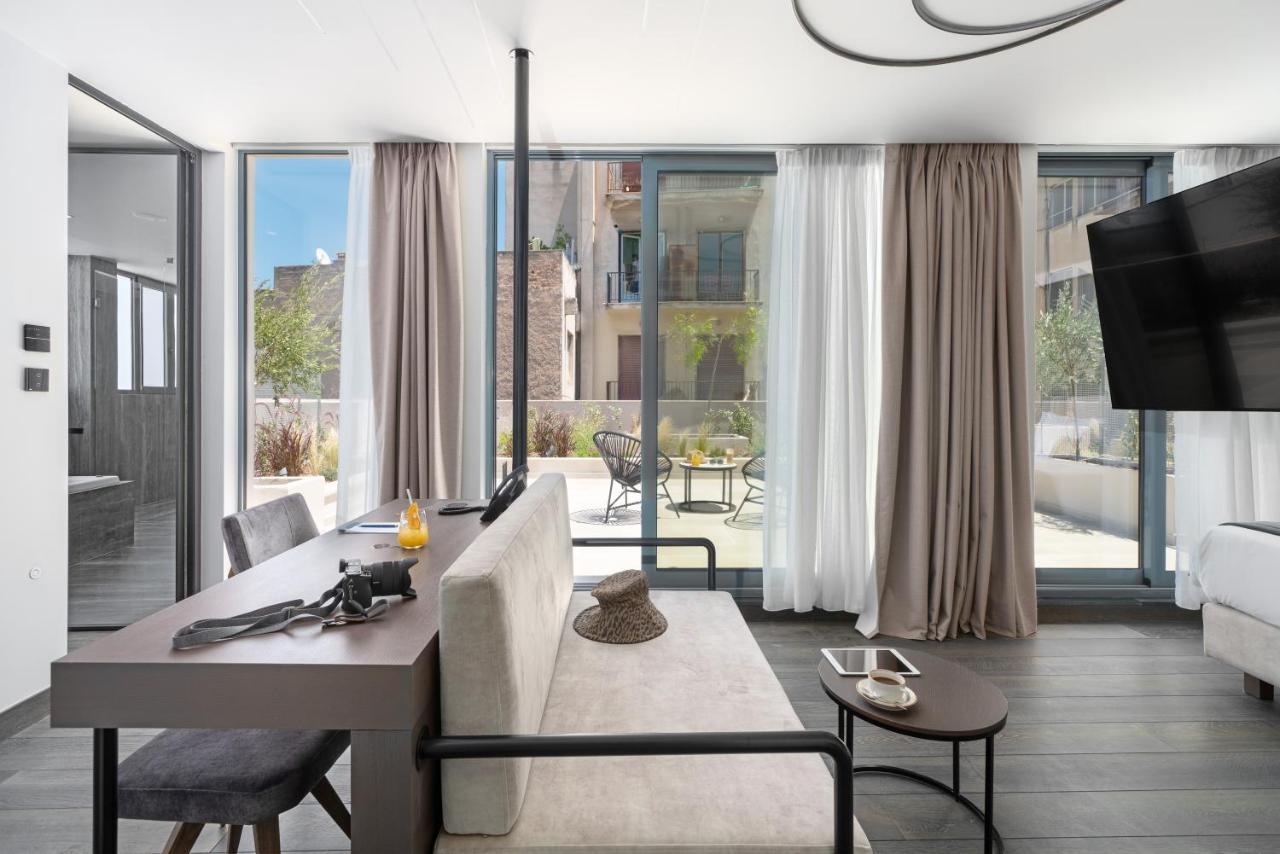 Hellenic Vibes Smart Hotel Athens Luaran gambar The interior of a suite at the hotel