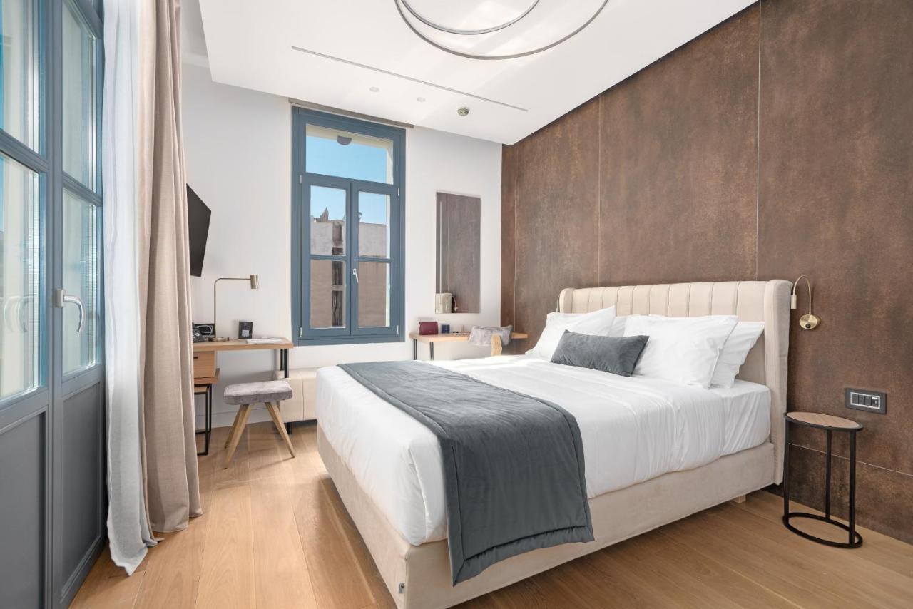Hellenic Vibes Smart Hotel Athens Luaran gambar A bedroom at the hotel